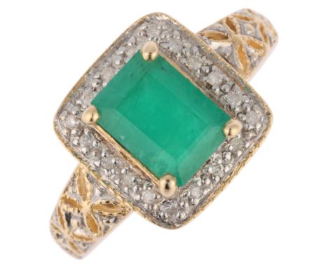 A 14ct gold emerald and diamond cluster ring, claw set with octagonal step-cut emerald surrounded by modern round brilliant-c