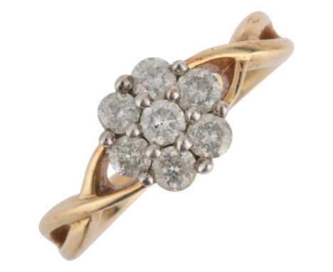 A 9ct gold diamond flowerhead cluster ring, set with modern round brilliant-cut diamonds, setting height 7.8mm, size K, 2.9g 