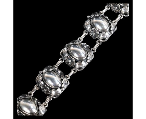 NIELS ANKER LETH JENSEN - an Art Nouveau Danish silver floral panel bracelet, band width 24.2mm, 18cm, 48.9g . Condition Repo