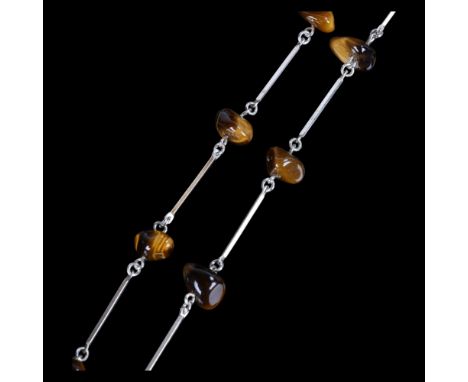 A Danish modernist silver tigers eye spacer link chain necklace, in the manner of Niels Erik From, 58cm, 23.4g . Condition Re