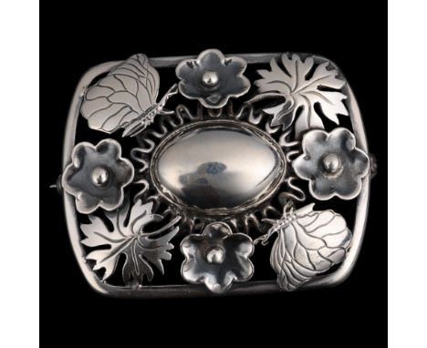 C BRUMBERG HANSEN - an Art Nouveau Danish silver floral bombe brooch, rectangular openwork form, with central boss with flowe