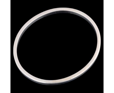 JENS JOHS AAGAARD - a Danish modernist sterling silver slave bangle, plain form, band width 5mm, internal circumference 19cm,