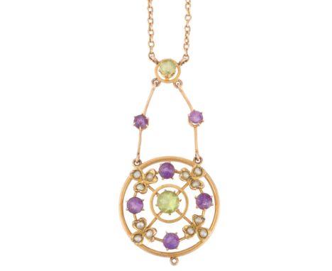 SUFFRAGETTE INTEREST - an Antique Edwardian 9ct rose gold peridot amethyst and split pearl openwork pendant necklace, the gem
