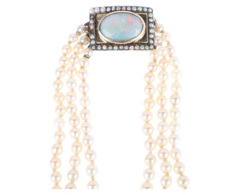 A Vintage triple row graduated pearl bead necklace, with gold opal and pearl clasp, pearls measure 7.8 - 3.0mm, 40cm, 48.7g .