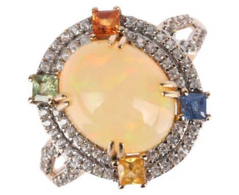 A 14ct gold gem set cluster ring, gemstones include Ethiopian opal citrine peridot sapphire and white sapphires, setting heig