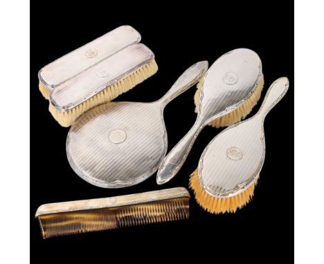 An Art Deco George V silver 6-piece travelling dressing table set, William Neale & Son Ltd, Birmingham 1925, engine turned de