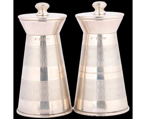A pair of Elizabeth II silver lighthouse salt and peppermills, Joseph Gloster Ltd, Birmingham 1968, tapered cylindrical form 