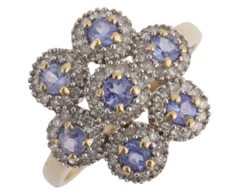 A 9ct gold tanzanite and diamond flowerhead cluster ring, setting height 15.4mm, size R, 2.6g . Condition Report:No damage or