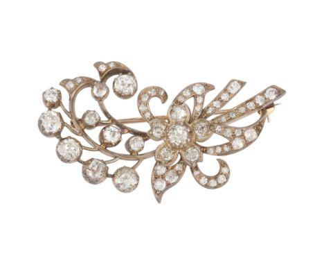 An Antique Victorian diamond floral spray brooch, circa 1890, the flowerhead and fronds cut-down collet set with old-cut diam