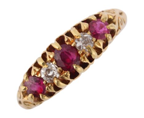 An Antique 18ct gold five stone ruby and diamond half hoop ring, maker AM, Birmingham 1910, setting height 5.6mm, size N, 3.1