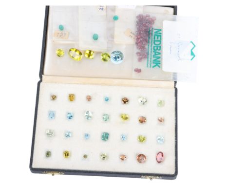 A quantity of unmounted gemstones, including Zimbabwean emerald aquamarine garnet heliodor, etc . Condition Report:Lot sold a