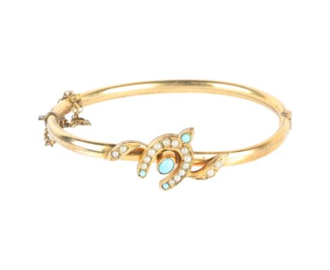 An Antique Victorian Pinchbeck turquoise and split pearl wishbone hinged bangle, setting height 16.9mm, internal circumferenc