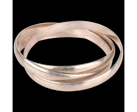 A sterling silver triple inter-locking bangle, each band width 7.8mm, internal circumference 20cm, 76.7g . Condition Report:N