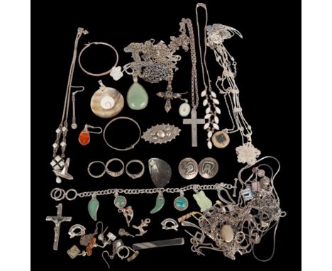 A quantity of silver jewellery, including Victorian brooch, chain necklaces, rings, bangles, etc . Condition Report:Lot sold 
