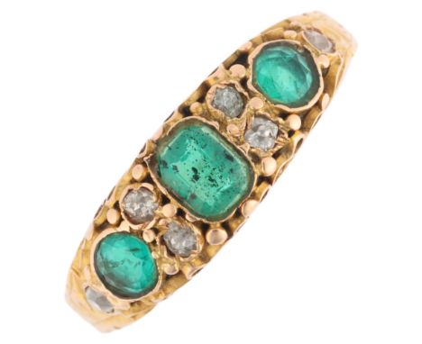 An Antique Victorian 18ct gold emerald and diamond half hoop ring, maker JA, Birmingham 1869, set with octagonal step-cut and