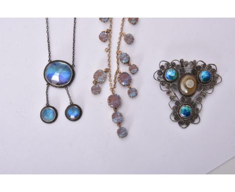 
	
		An early 20th century coloured paste fringe necklace, the belcher link necklace suspending a fringe of graduated facette