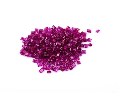 
	
		†&nbsp;A parcel of unmounted step cut rubies, approximately 66.5 cartas total
		
		Condition Report: 
		No condition rep