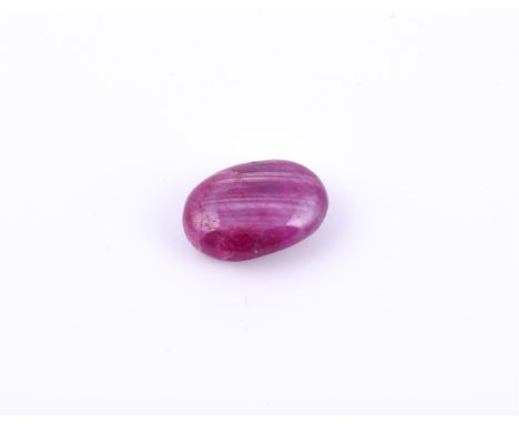 
	
		†&nbsp;An oval cabochon unmounted ruby, weighing 13.62 carats
		
		Condition Report: 
		reflective inclusions, silk, fur