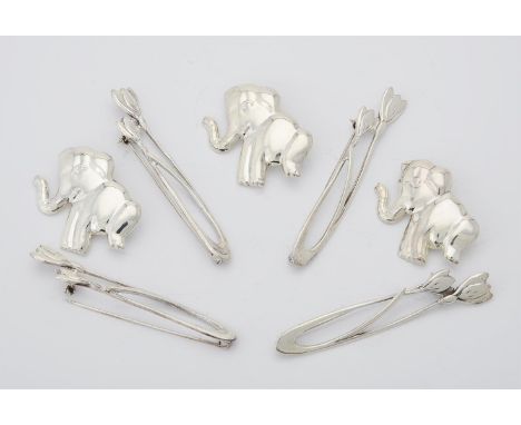
	
		A quantity of silver elephant and flower brooches, comprising a number of stylised elephants brooches, and stylised croc