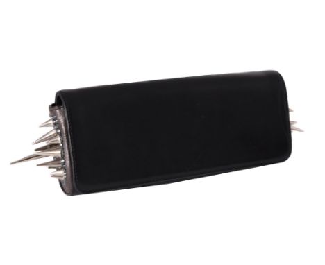 
	
		Christian Louboutin, a black leather and spiked clutch bag, with magnetic fasteners, the flap opening to a red satin int