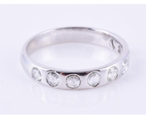 
	
		A rose cut diamond band ring, 18 carat gold hallmark, finger size M 1/2, 2.5g gross 

	

