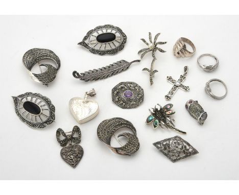 
	
		A collection of silver coloured marcasite brooches, stamped 925, to include flower brooches, 5.8cm long; pierced ovoid b