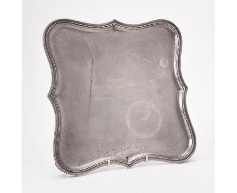 
	
		A silver shaped square salver by William Comyns &amp; Sons Ltd. (Richard Comyns), London 1932, with a raised moulded bor