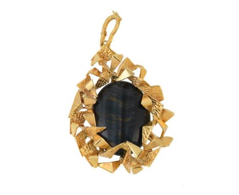 
	
		A 9 carat gold 1970s hawk's eye pendant, the oval cabochon hawk's eye within a textured geometric surround, stamped H&am