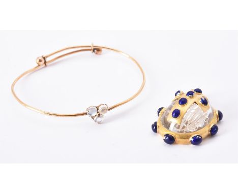 
	
		A mid Victorian enamel and rock crystal pendant, circa 1880, the cabochon rock crustal with initials to the reverse and 