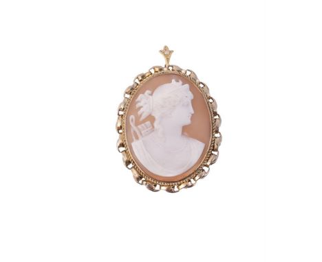 
	
		A late 19th century shell cameo of Diana, the oval panel carved with the profile of Diana wearing a moon diadem, holding