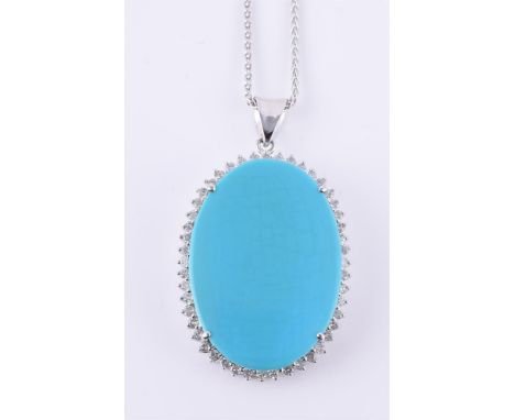 
	
		A reconstituted turquoise and diamond cluster pendant, the oval reconstituted turquoise panel within a surround of brill