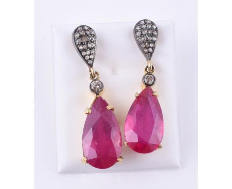 
	
		A pair of synthetic ruby and diamond drop earrings, the pear shaped synthetic ruby drops suspended by brilliant cut diam