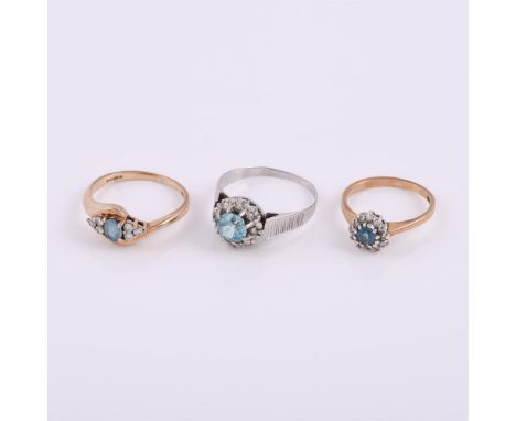 
	
		A blue zircon and diamond cluster ring, the central circular cut blue zircon within a surround of eight cut diamonds, fi