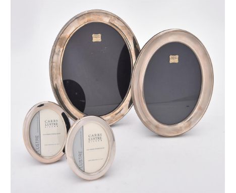 
	
		Four silver mounted oval photo frames, two by PJP, Edinburgh 2009 and two by Carr's of Sheffield 2007, the tallest 24cm 