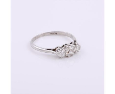 
	
		A three stone diamond ring, the graduated old brilliant cut diamonds in claw settings, approximately 0.60 carats total, 