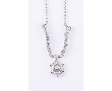 
	
		A diamond convertible pendant, the central diamond cluster with a convertible diamond surround, with magnetic close, to 