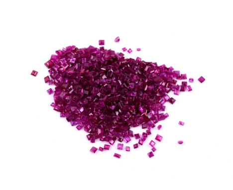 
	
		†&nbsp;A parcel of step cut rubies, approximately 63.6 carats total
		
		Condition Report: 
		No condition report is ava