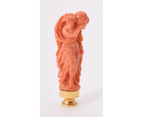 
	
		Y&nbsp;A coral seal of a female figure, early 20th century, with a gold coloured oval matrix, engraved A, 7.5cm (3in) hi