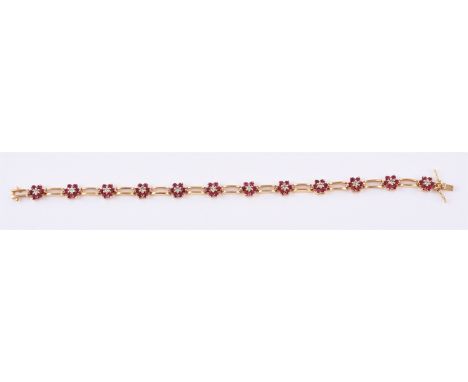 
	
		A ruby and diamond flowerhead cluster bracelet, the ruby and diamond clusters interspaced with pierced polished bar conn