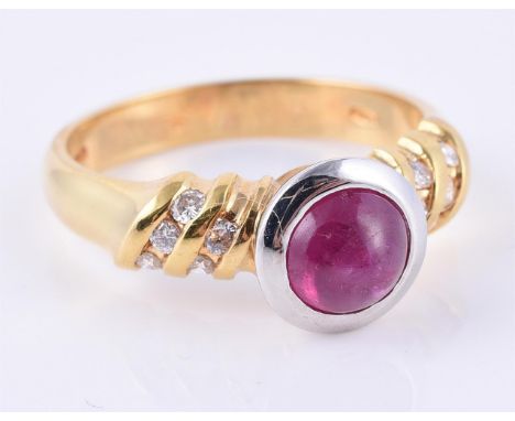 
	
		A ruby and diamond ring, the cabochon ruby rub over set above brilliant cut diamond five stone shoulders, mounted in 18 