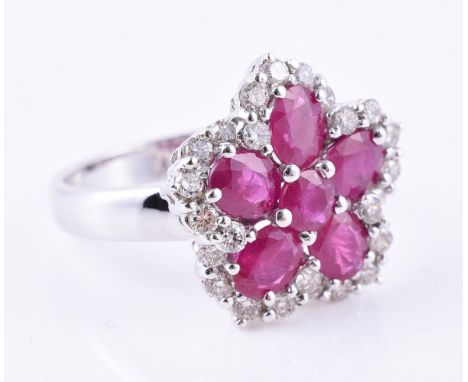 
	
		A ruby and diamond cluster ring, set with six oval and circular mixed cut rubies within an outer surround of brilliant c