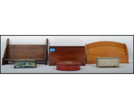 A dealers lot to include a mahogany caddy box, oak jacobean revival desk tidy and a selection of old biscuit tins. Measuremen