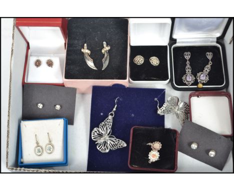 A collection of vintage ladies earrings to include Butterfly, heart, art nouveau, enamel, rhinestone, swords etc.