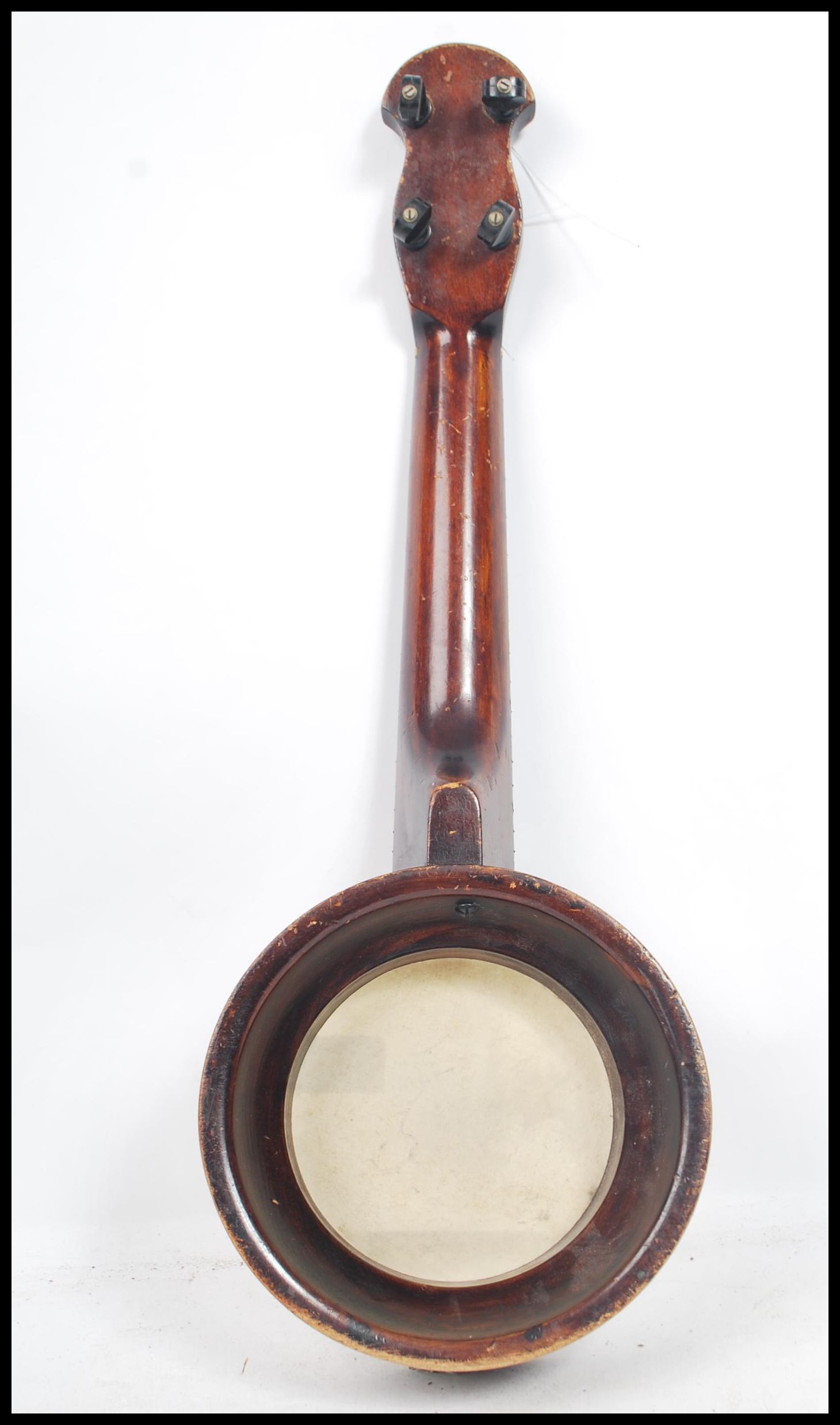Musical Instruments A vintage 20th century four string banjo / Ukulele