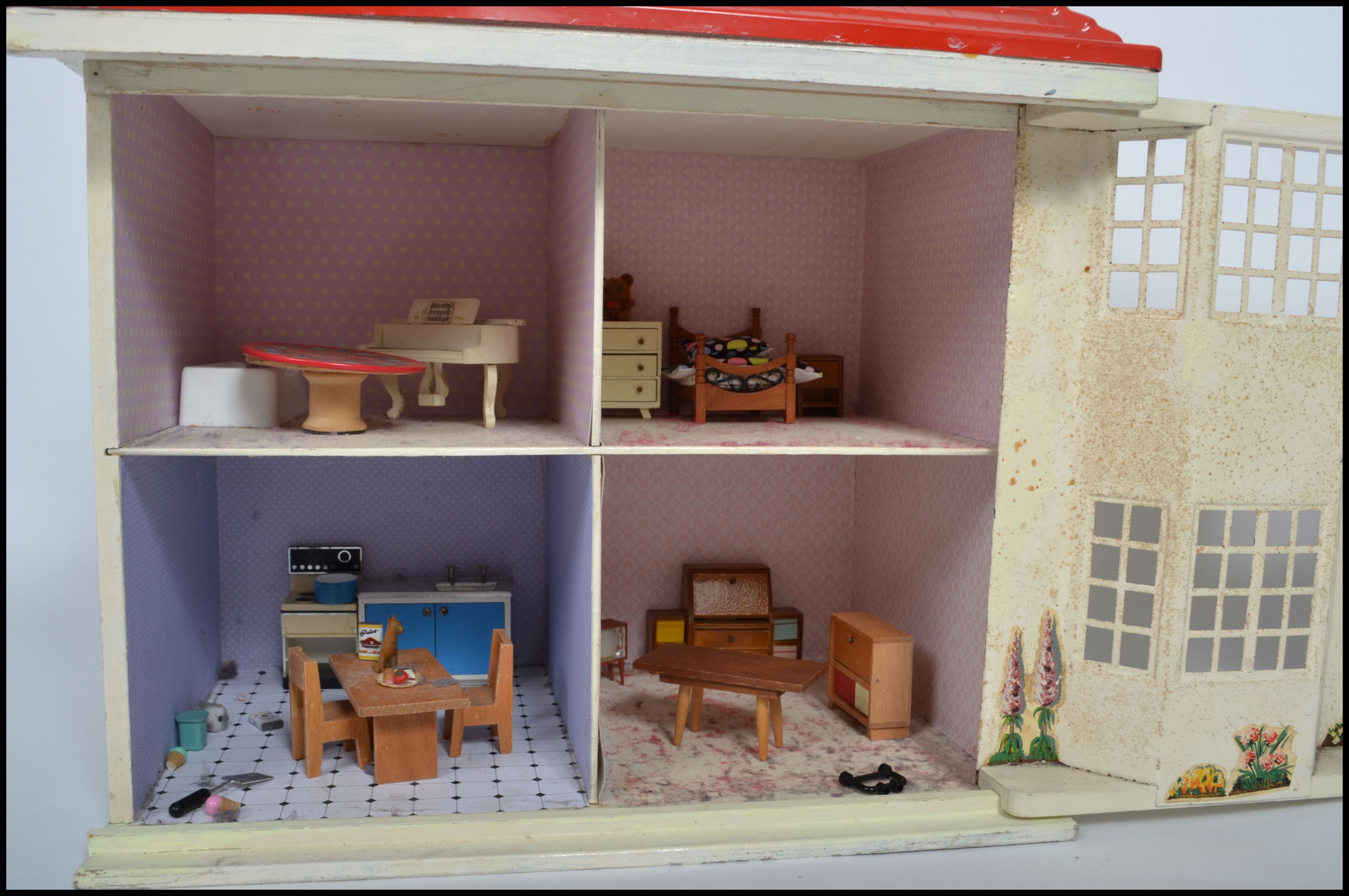 A vintage Triang dolls house and accessories together with a large ...