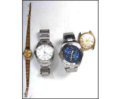 A group of four vintage watches to include a Seiko 100M, a ladies Rotary 17 jewel Incabloc, a Mondaine 25 jewel and a Ben She