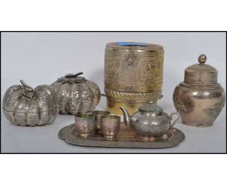 A collection of indian silver plated wares to include caddy, liqueur shot set with tray, cylindrical box with chain etc