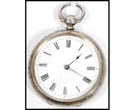 A silver hallmarked chase decorated open faced pocket watch, Roman numeral chapter ring on enamel face. Birmingham assay mark