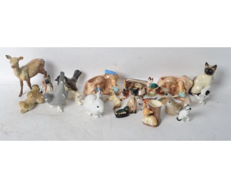 A collection of ceramic animals to include a Beswick Reindeer, Hornsea, SylvaC, USSR etc. Please see images. 