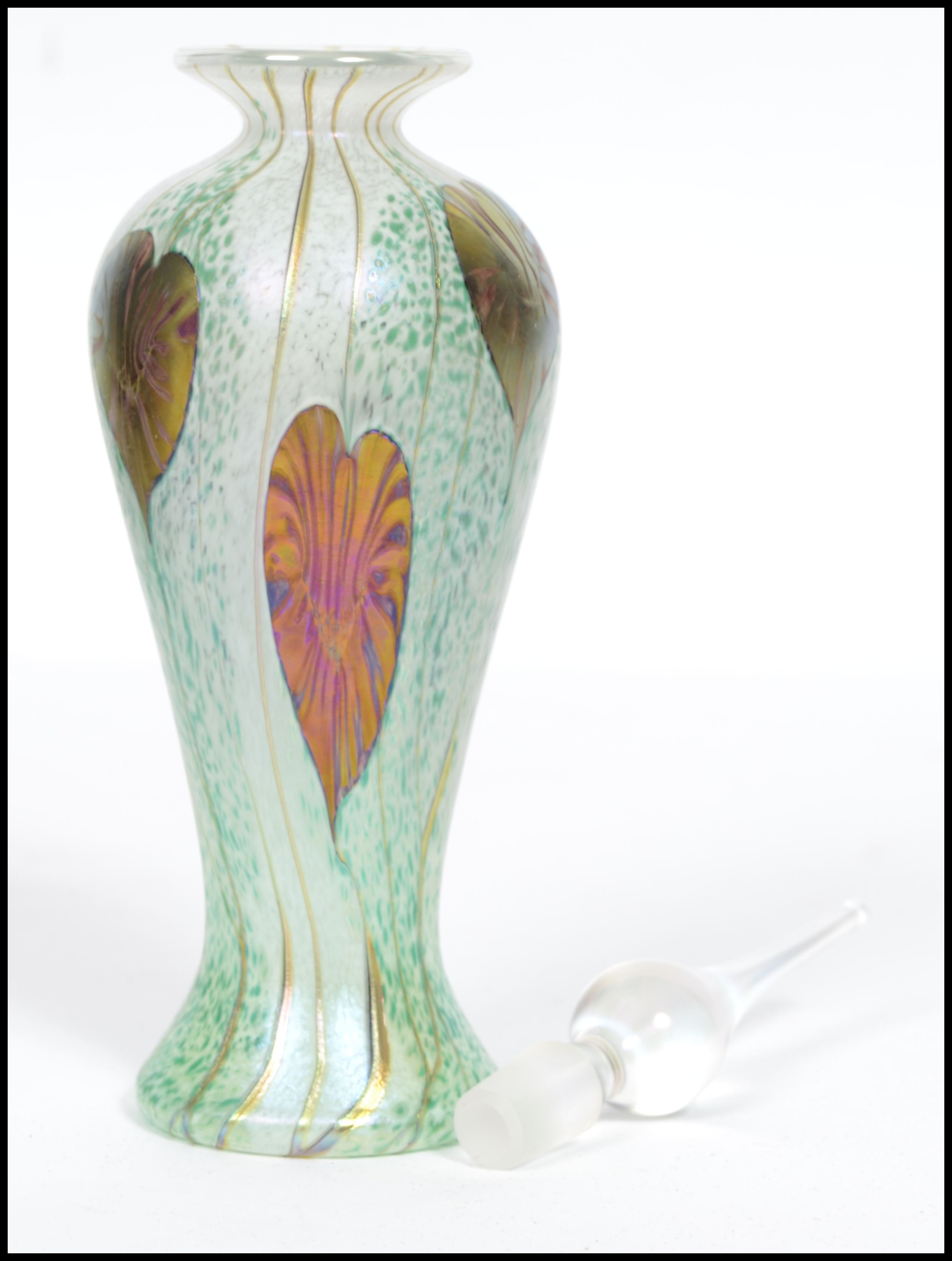 An Okra studio glass limited edition perfume bottle in the form of a